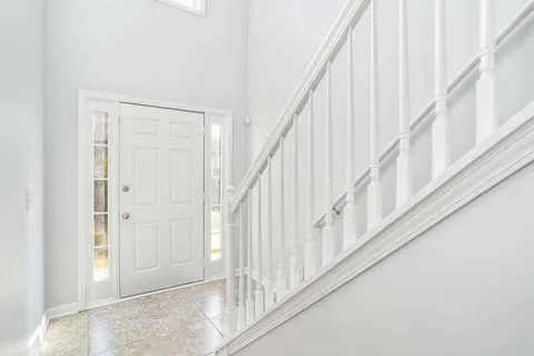 a view of staircase with white walls and white walls
