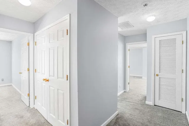 wooden view of a bathroom with a sink