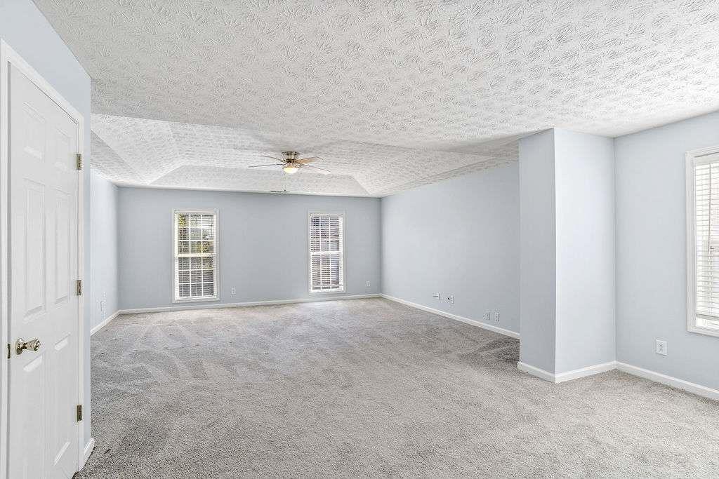 1461 Enchanted Forest Drive Conley, GA 30288 - Photo 24 of 47 a view of an empty room with a window