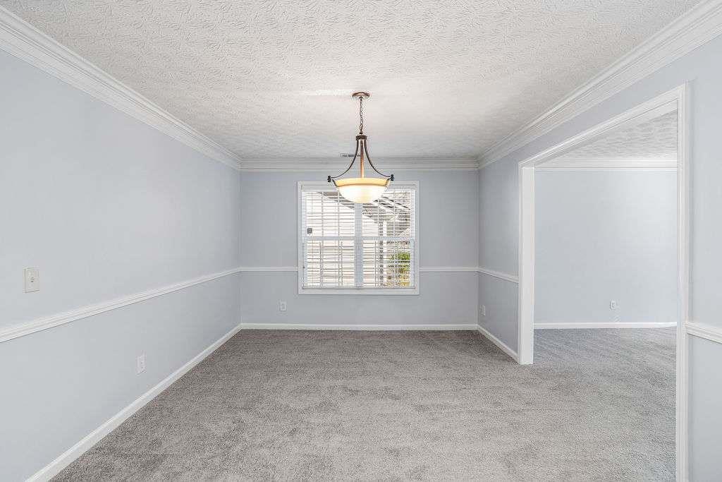 1461 Enchanted Forest Drive Conley, GA 30288 - Photo 8 of 47 a very nice looking room with a window