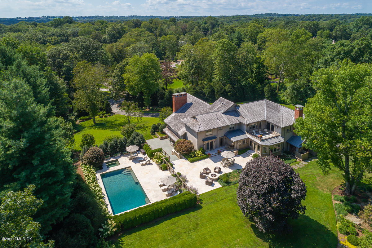 an aerial view of a house with a garden