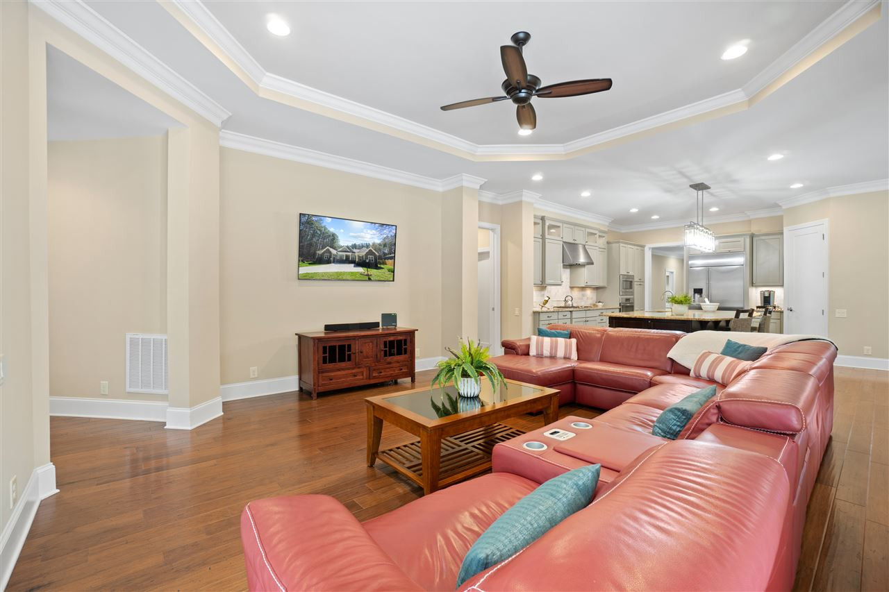 1504 Brassfield Road Raleigh, NC 27614 - Photo 8 of 30 Family Room with Wall of Sliding Doors to Lanai