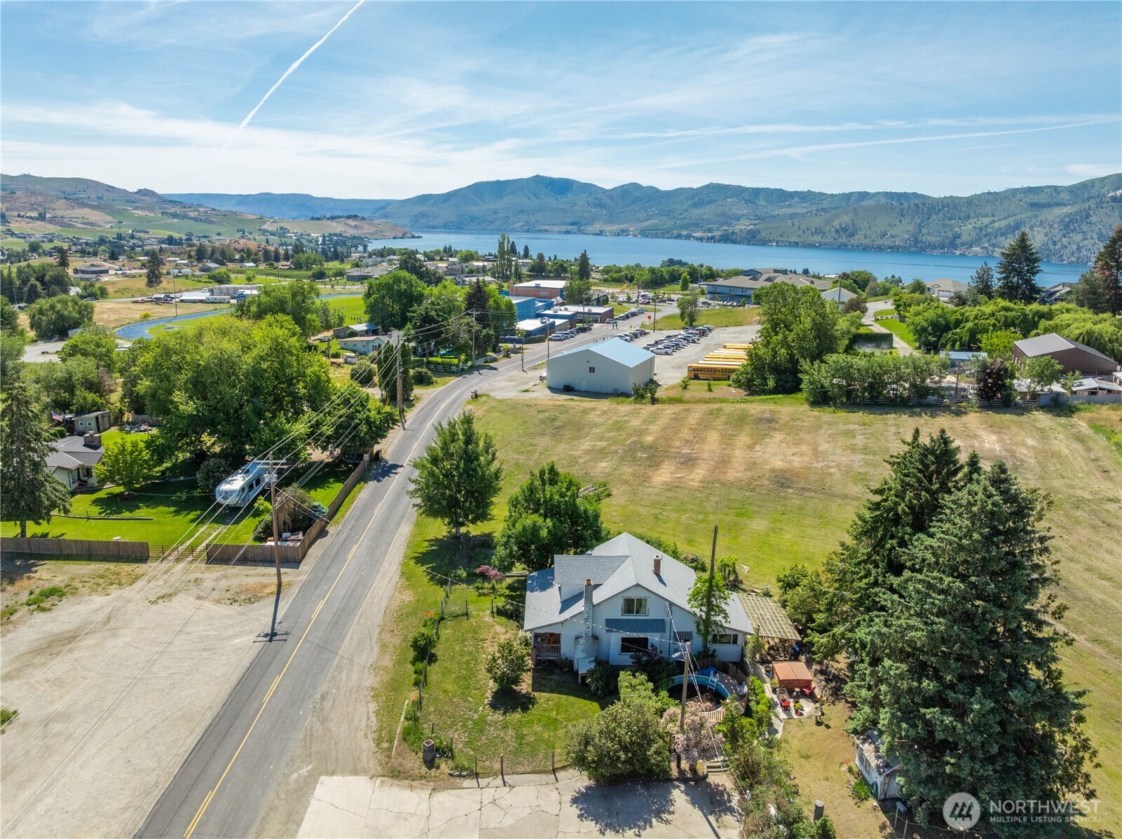 1281 Totem Pole Road Manson, WA 98831 - Photo 38 of 39 a view of a city with mountains in the background