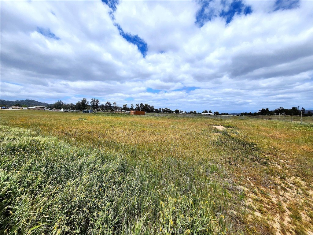 0 Inyo Nuevo, CA 92567 - Photo 7 of 15 a view of a lake and a houses in the background