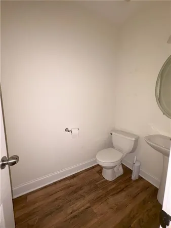 a bathroom with a toilet and a sink