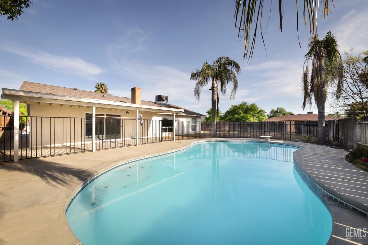 Undisclosed Address Bakersfield, CA 93306 - Photo 38 of 44 a front view of a house with swimming pool