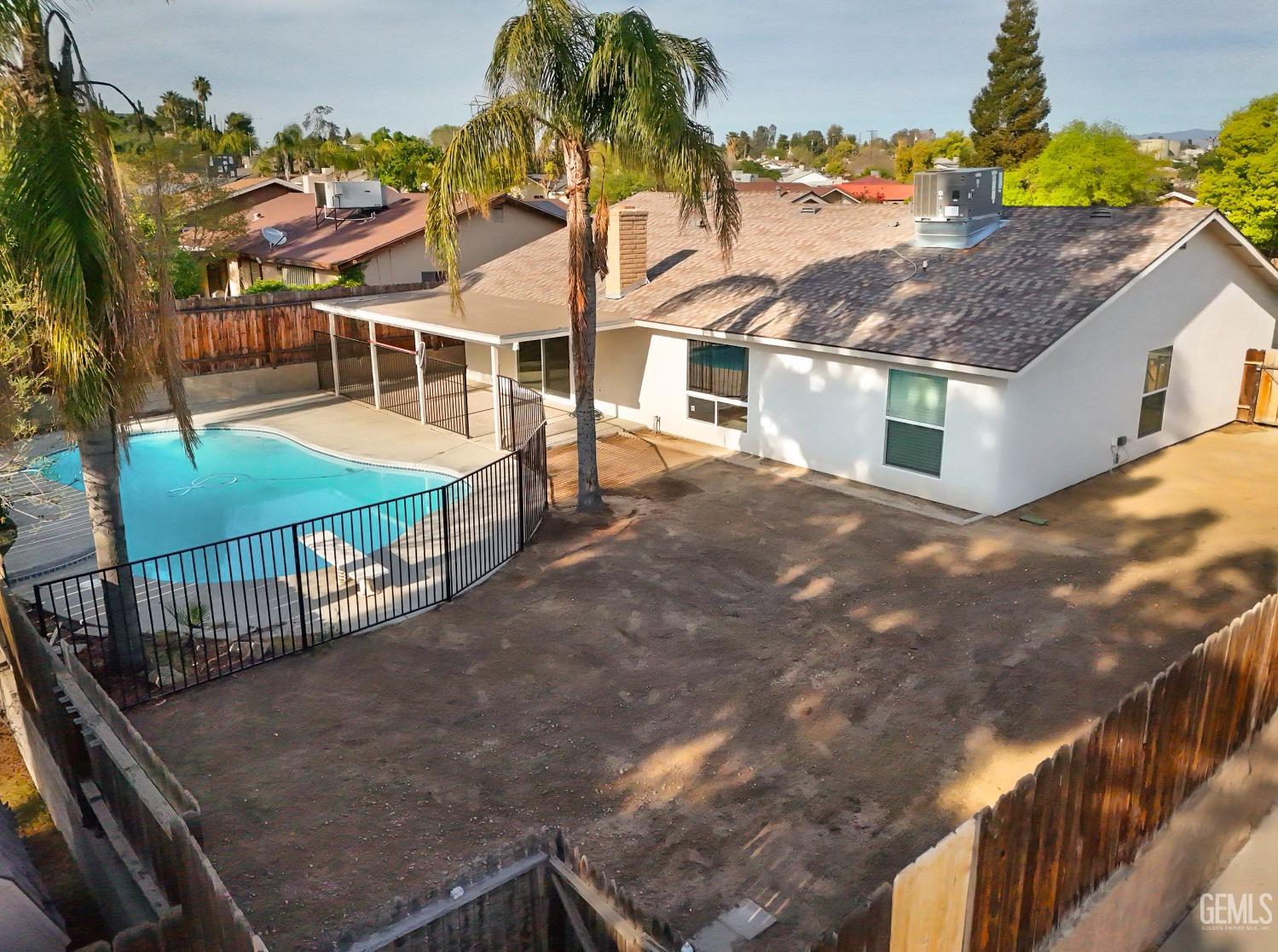 Undisclosed Address Bakersfield, CA 93306 - Photo 41 of 44 a view of a white building among the street