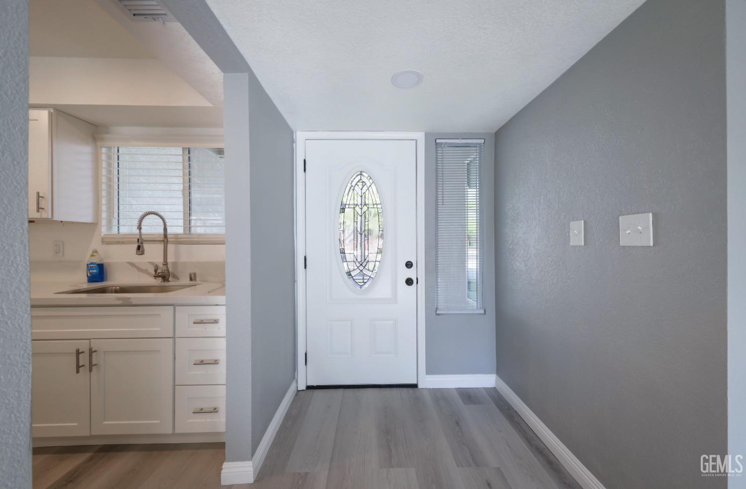 Undisclosed Address Bakersfield, CA 93306 - Photo 6 of 44 a bathroom with a sink a toilet and a mirror