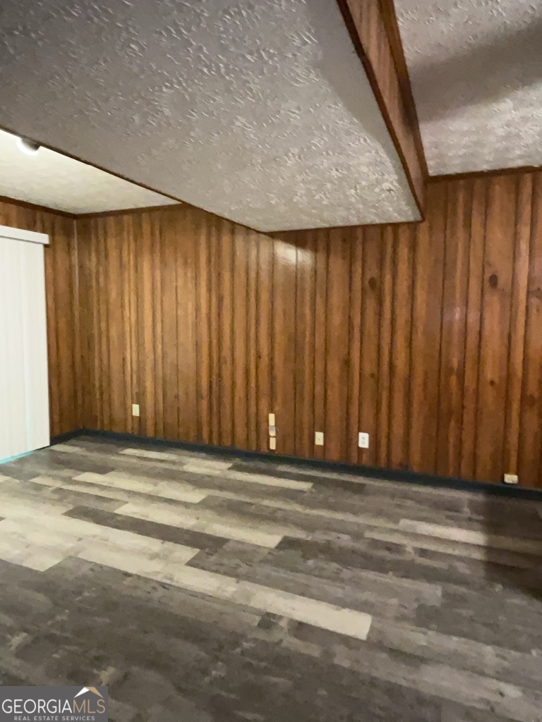 1265 Herrington Road Lawrenceville, GA 30044 - Photo 41 of 52 a view of wooden floor and staircase