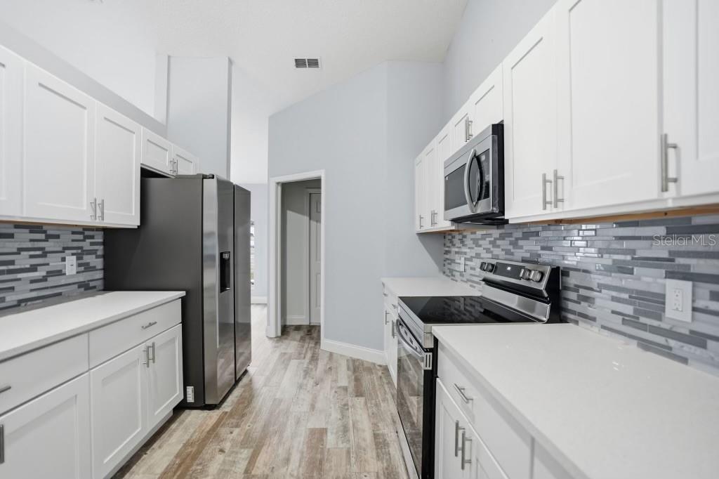 9476 Spring Hill Drive Spring Hill, FL 34608 - Photo 13 of 38