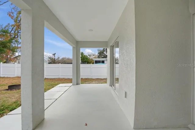 a view of a room with porch and a yard
