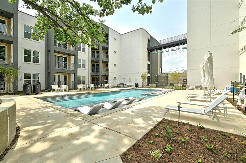 4801 Springdale Road, Unit 2010 Austin, TX 78723 - Photo 24 of 28 Community pool featuring a patio
