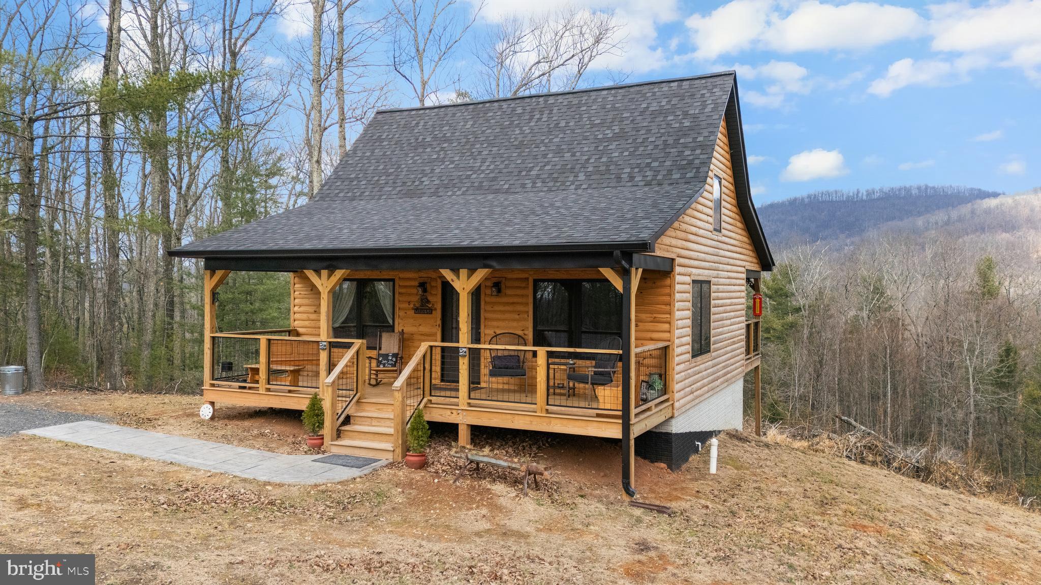 1823 Desert Road Reva, VA 22735 - Photo 2 of 28 a house view with a backyard space