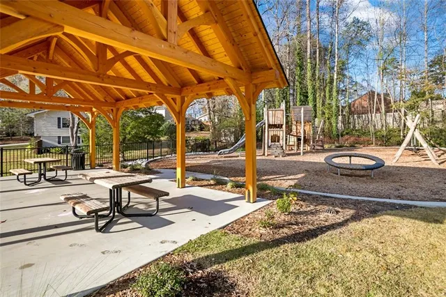 a view of a swimming pool with a patio