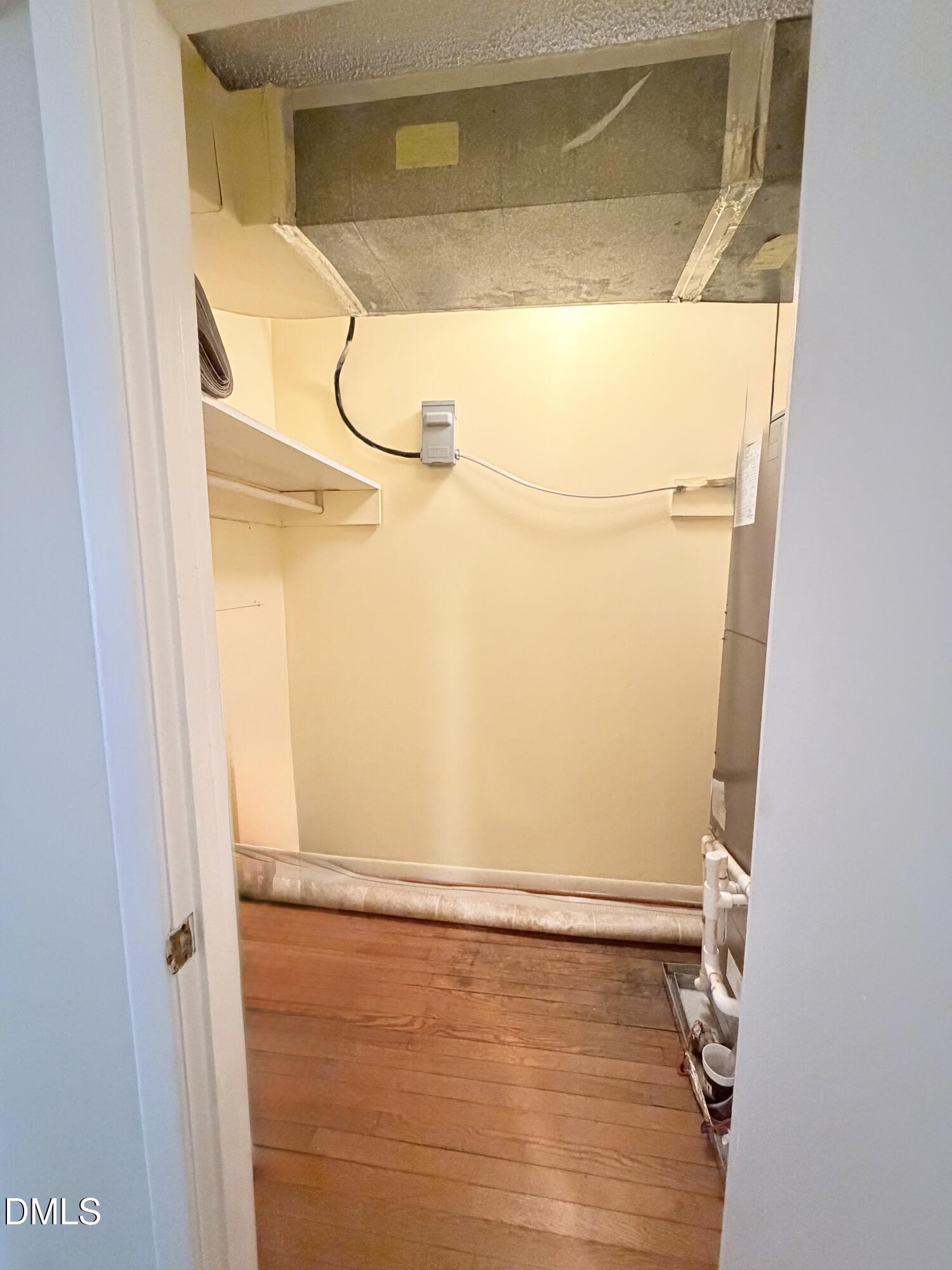 2375 Champion Court Raleigh, NC 27606 - Photo 17 of 31 a bathroom with a glass shower door