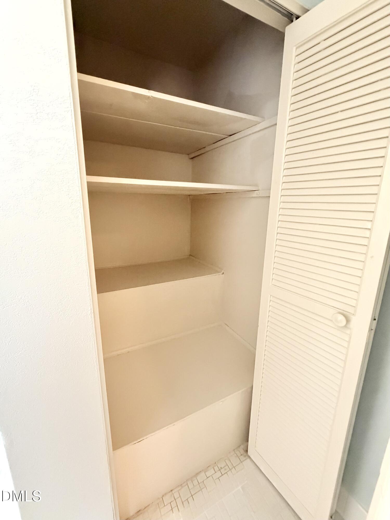 2375 Champion Court Raleigh, NC 27606 - Photo 23 of 31 a bathroom with a bathtub