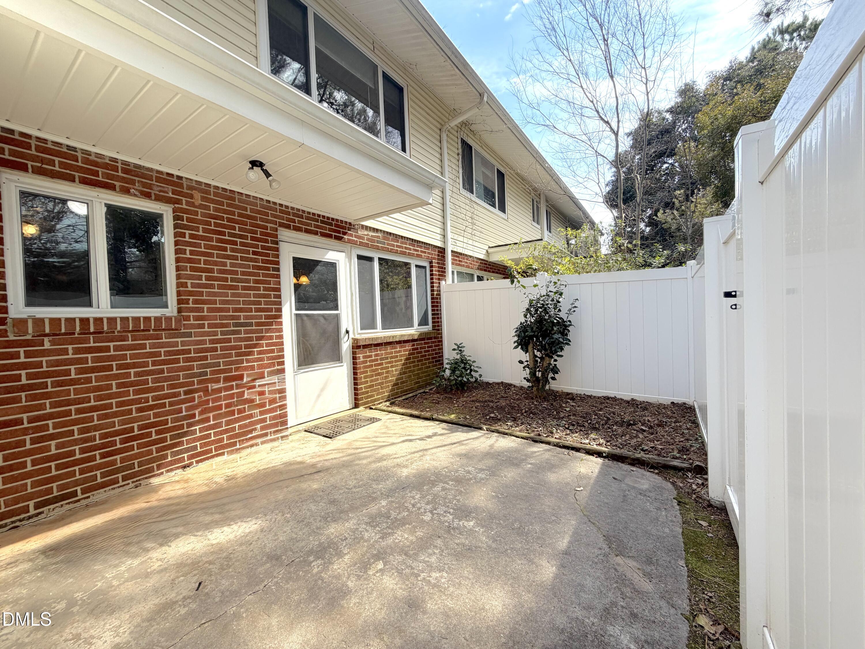 2375 Champion Court Raleigh, NC 27606 - Photo 30 of 31 a view of a house with a yard