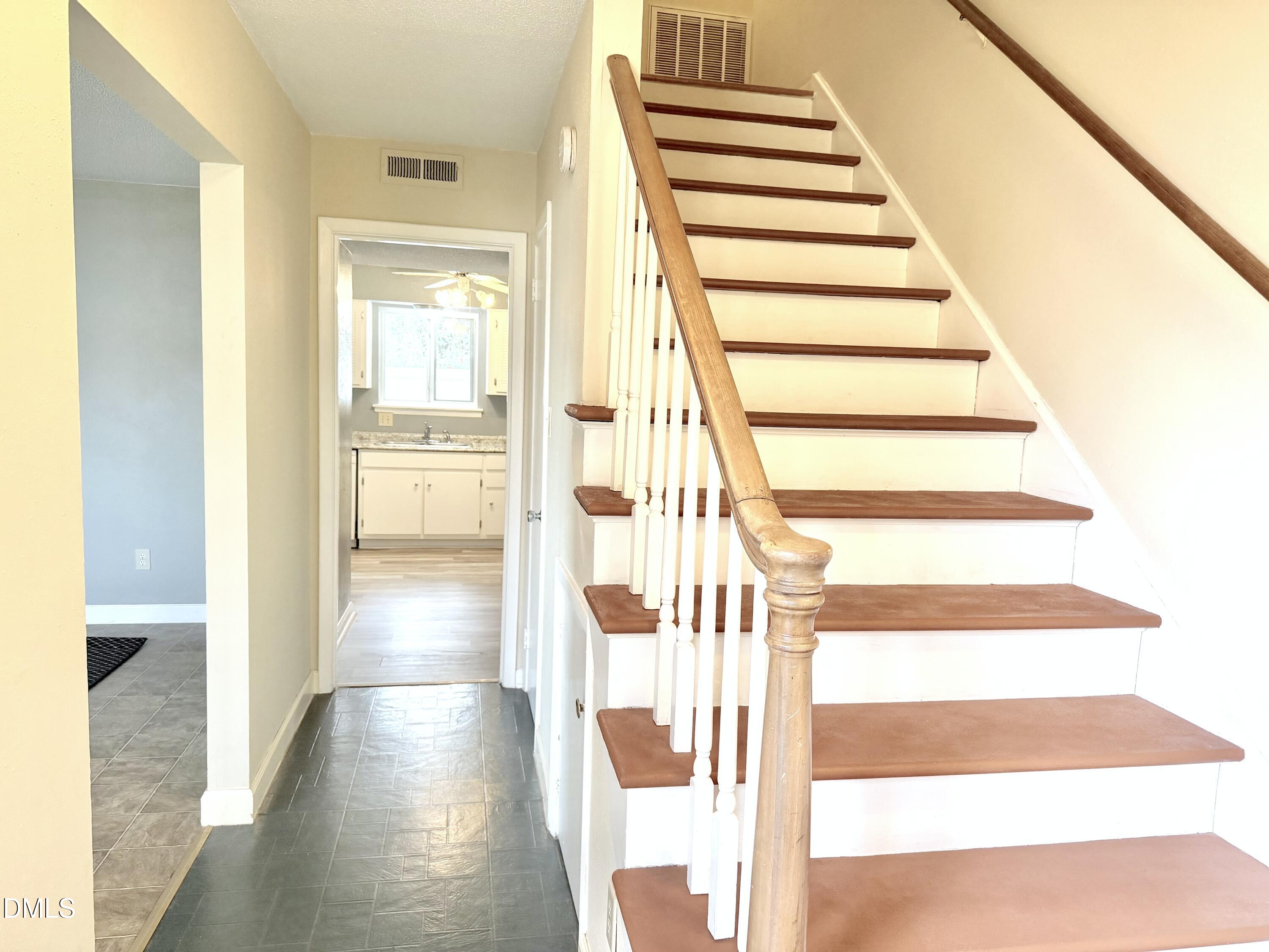 2375 Champion Court Raleigh, NC 27606 - Photo 3 of 31 a view of entryway with wooden floor