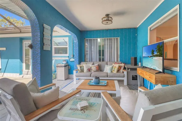 a view of swimming pool with a patio