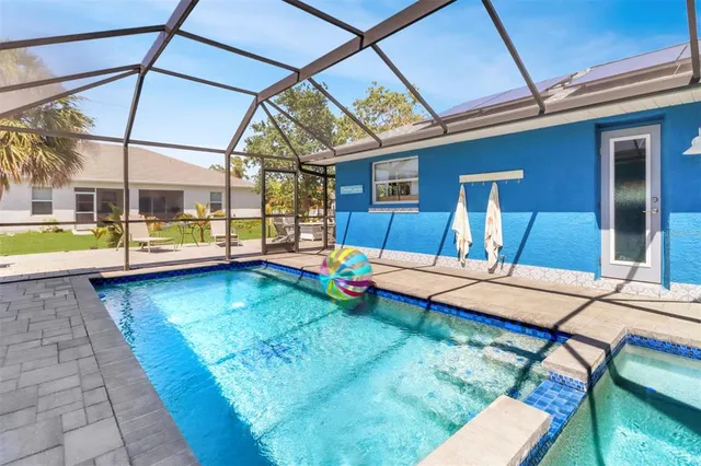 a living room with furniture rug and window