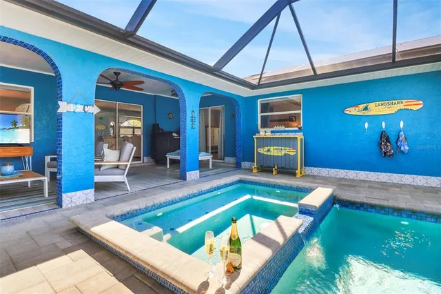 a view of a chairs and table in patio