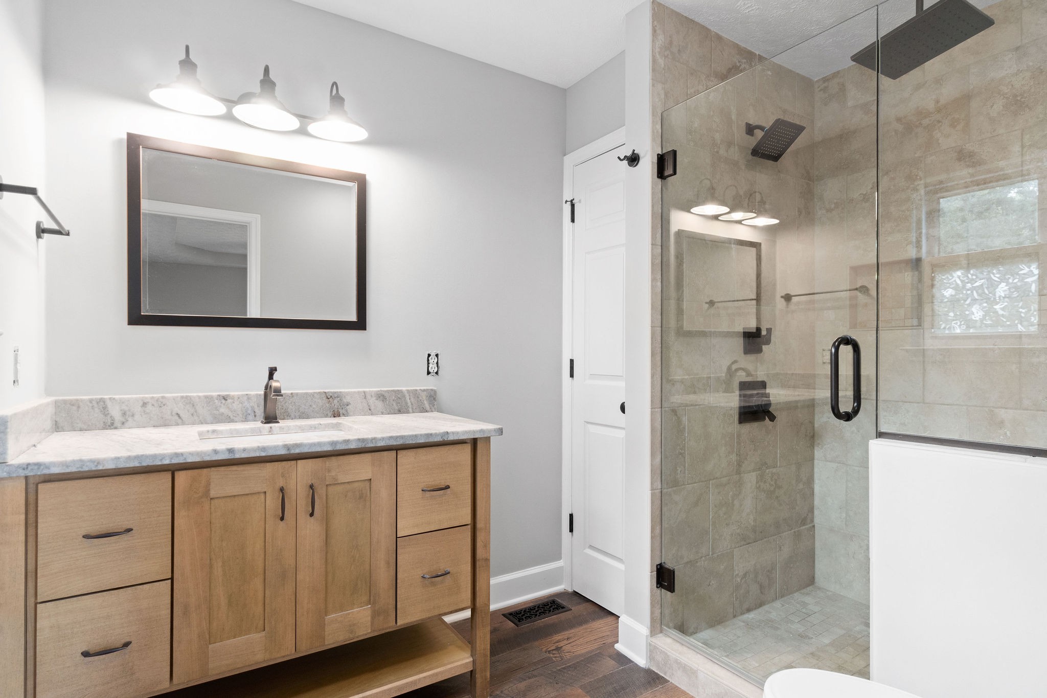 1011 Cherokee Trail Springfield, TN 37172 - Photo 19 of 40 a bathroom with a granite countertop sink mirror and shower