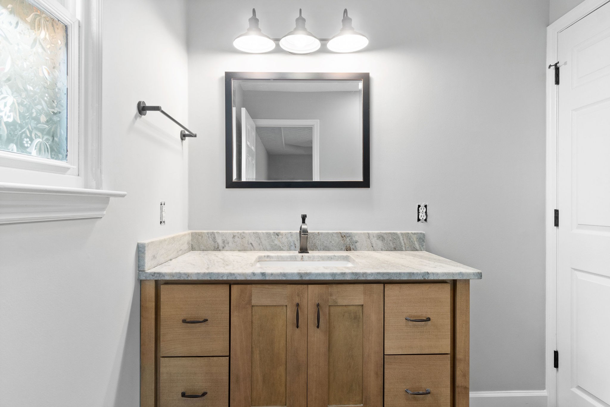 1011 Cherokee Trail Springfield, TN 37172 - Photo 20 of 40 a bathroom with a granite countertop sink a mirror and a vanity