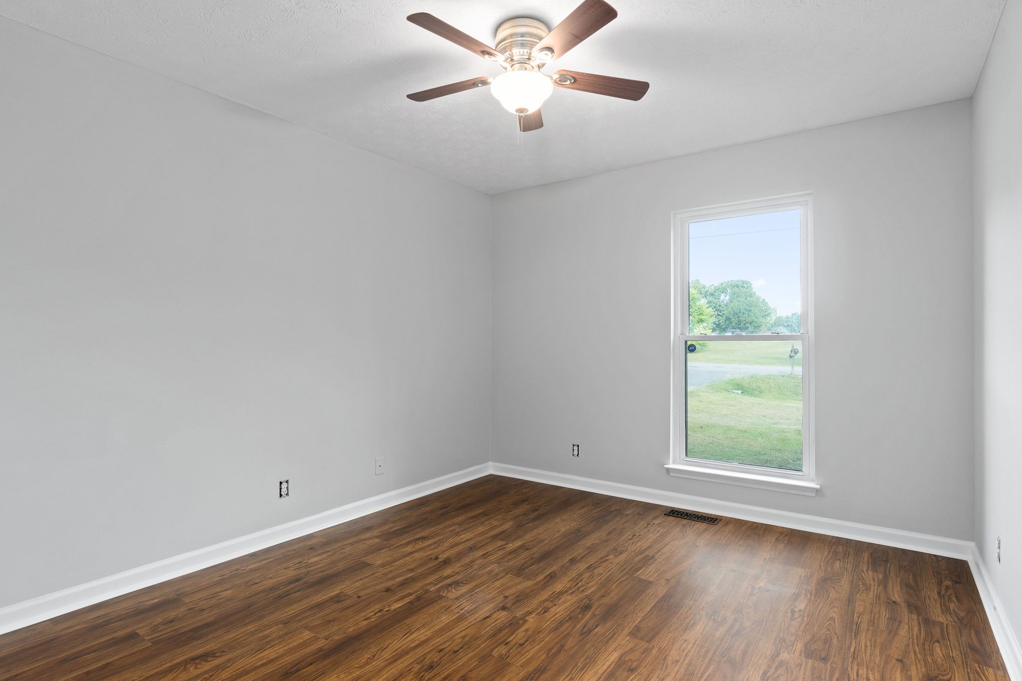 1011 Cherokee Trail Springfield, TN 37172 - Photo 23 of 40 wooden floor in an empty room with a window