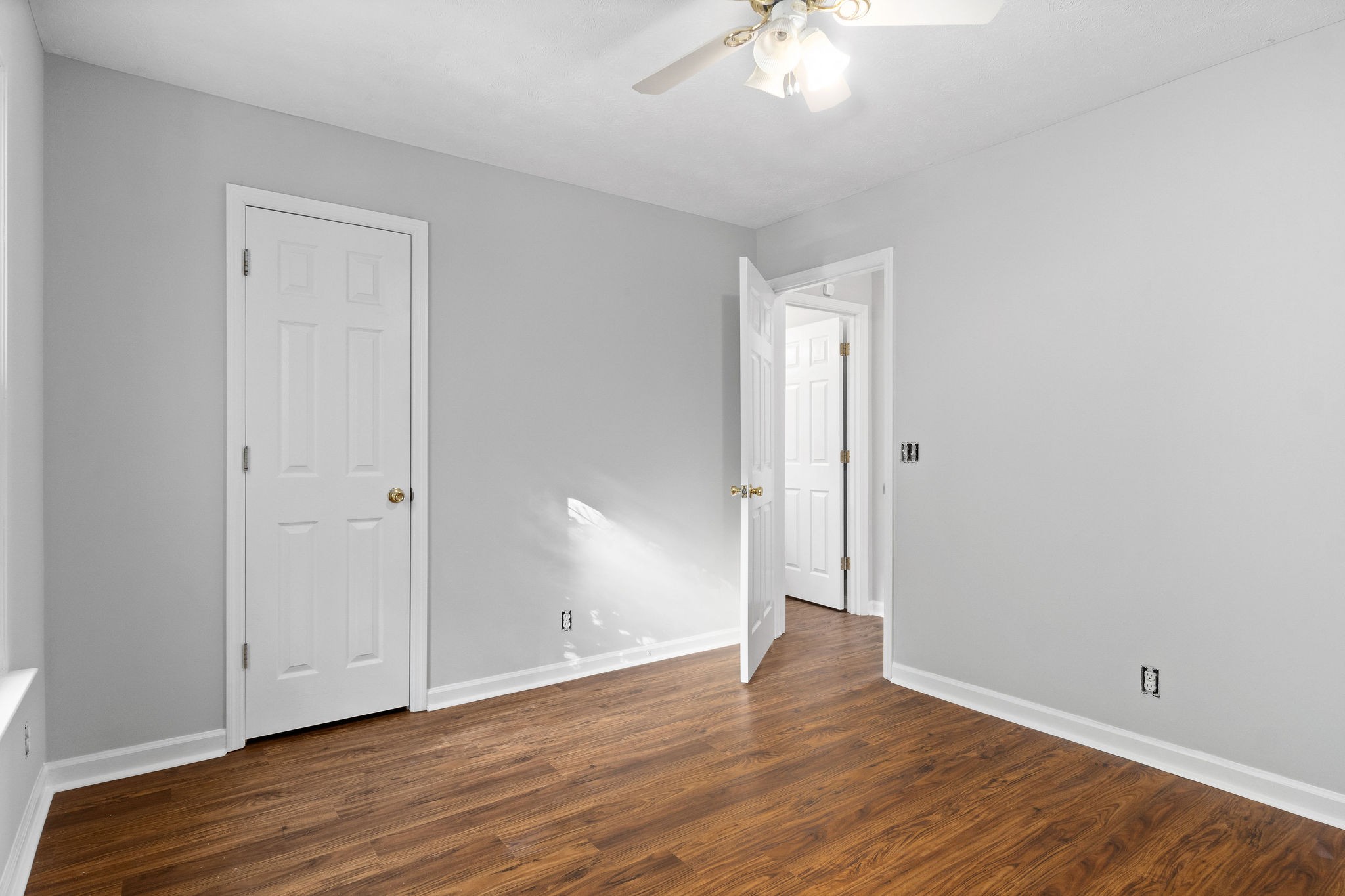 1011 Cherokee Trail Springfield, TN 37172 - Photo 26 of 40 a view of an empty room with wooden floor