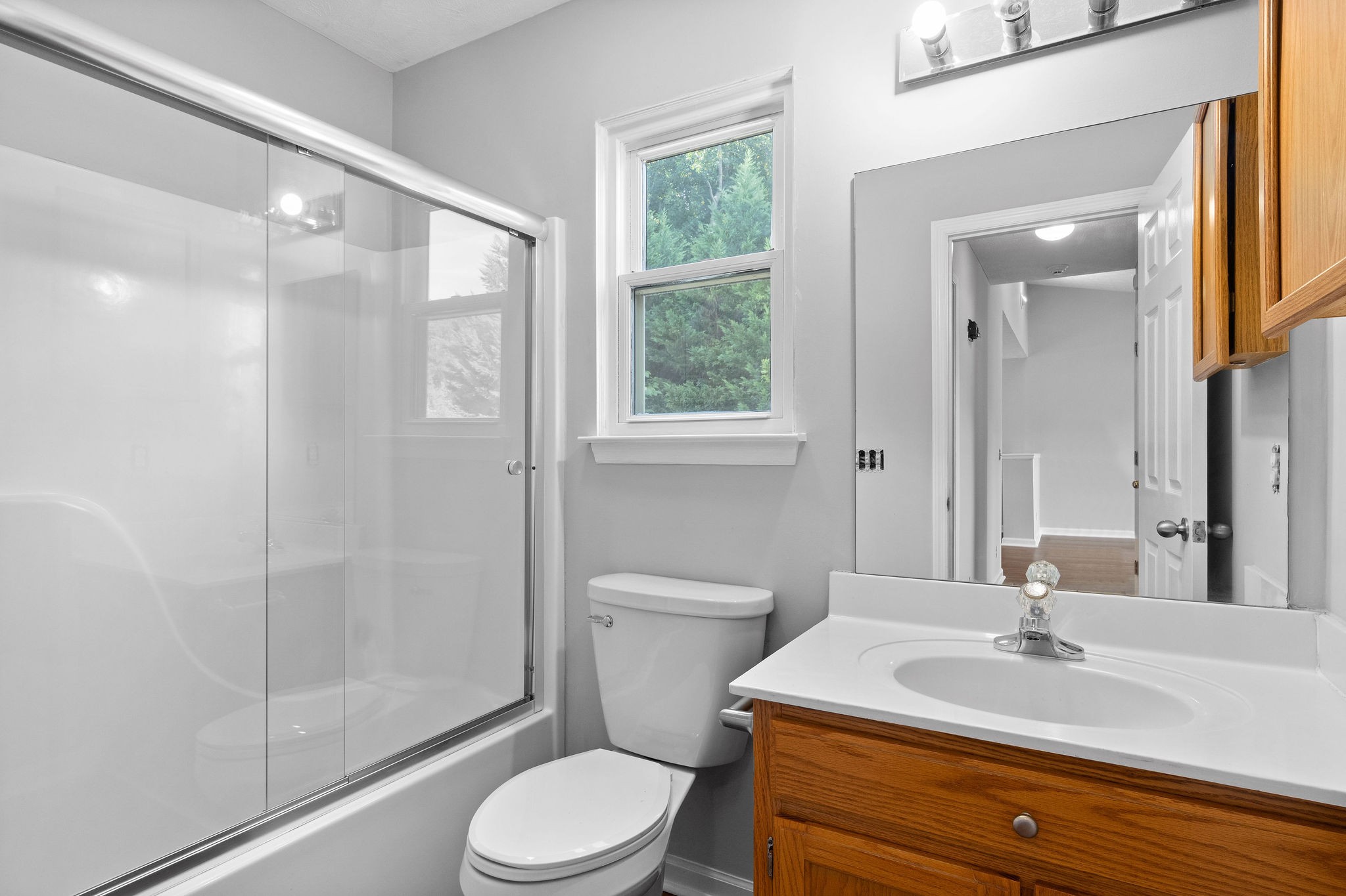 1011 Cherokee Trail Springfield, TN 37172 - Photo 27 of 40 a bathroom with a sink a toilet and shower