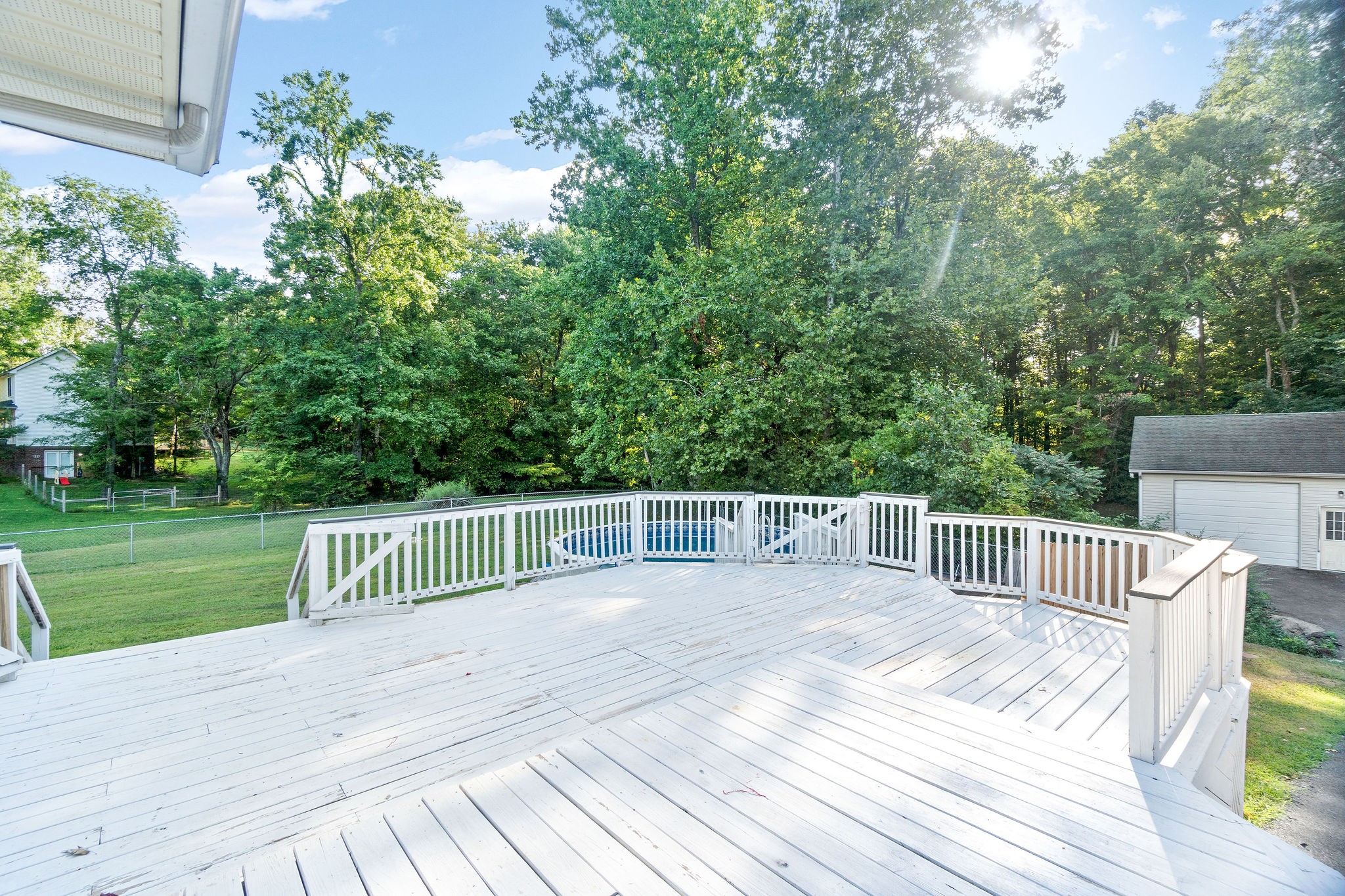 1011 Cherokee Trail Springfield, TN 37172 - Photo 30 of 40 a view of backyard with a garden and deck