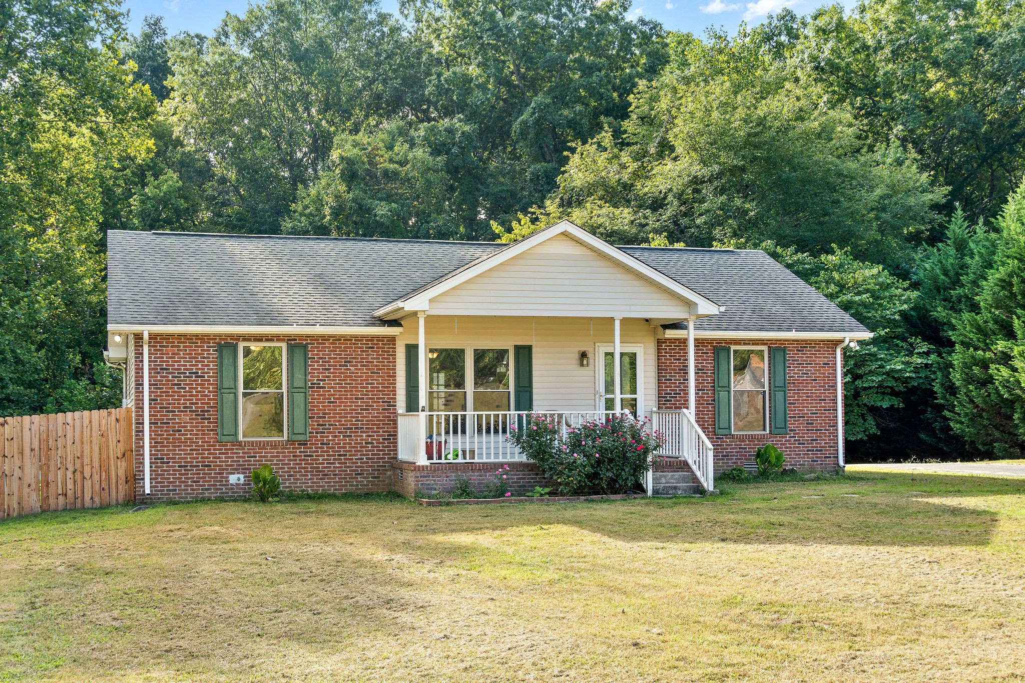 1011 Cherokee Trail Springfield, TN 37172 - Photo 3 of 40 a front view of a house with a garden