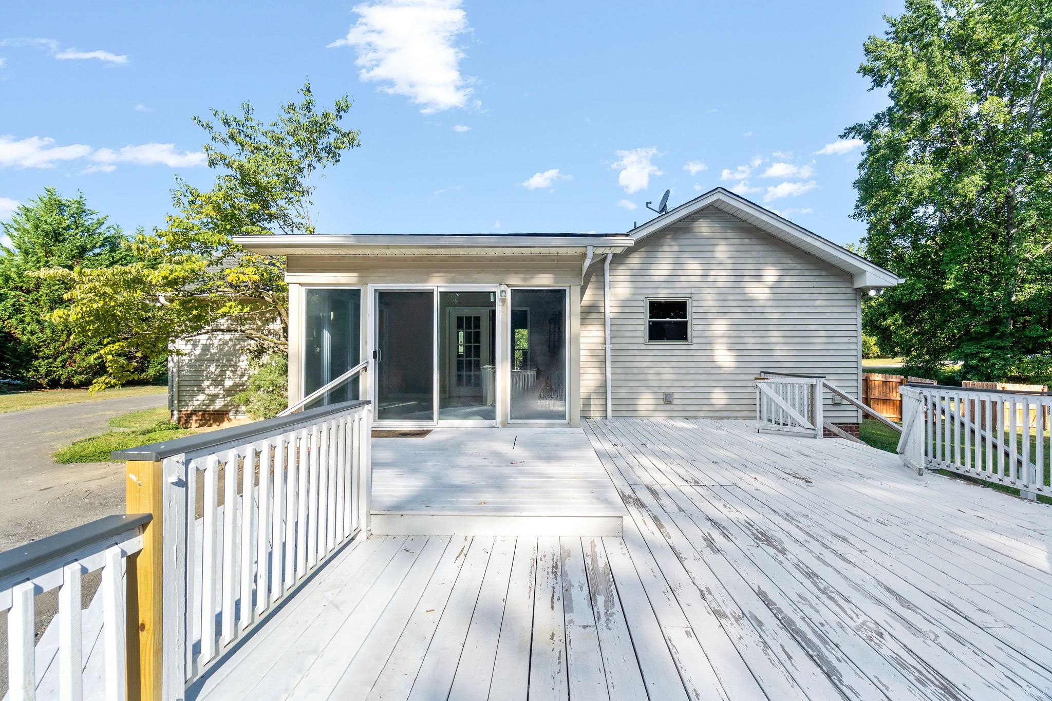 1011 Cherokee Trail Springfield, TN 37172 - Photo 35 of 40 a view of a house with a yard and wooden deck