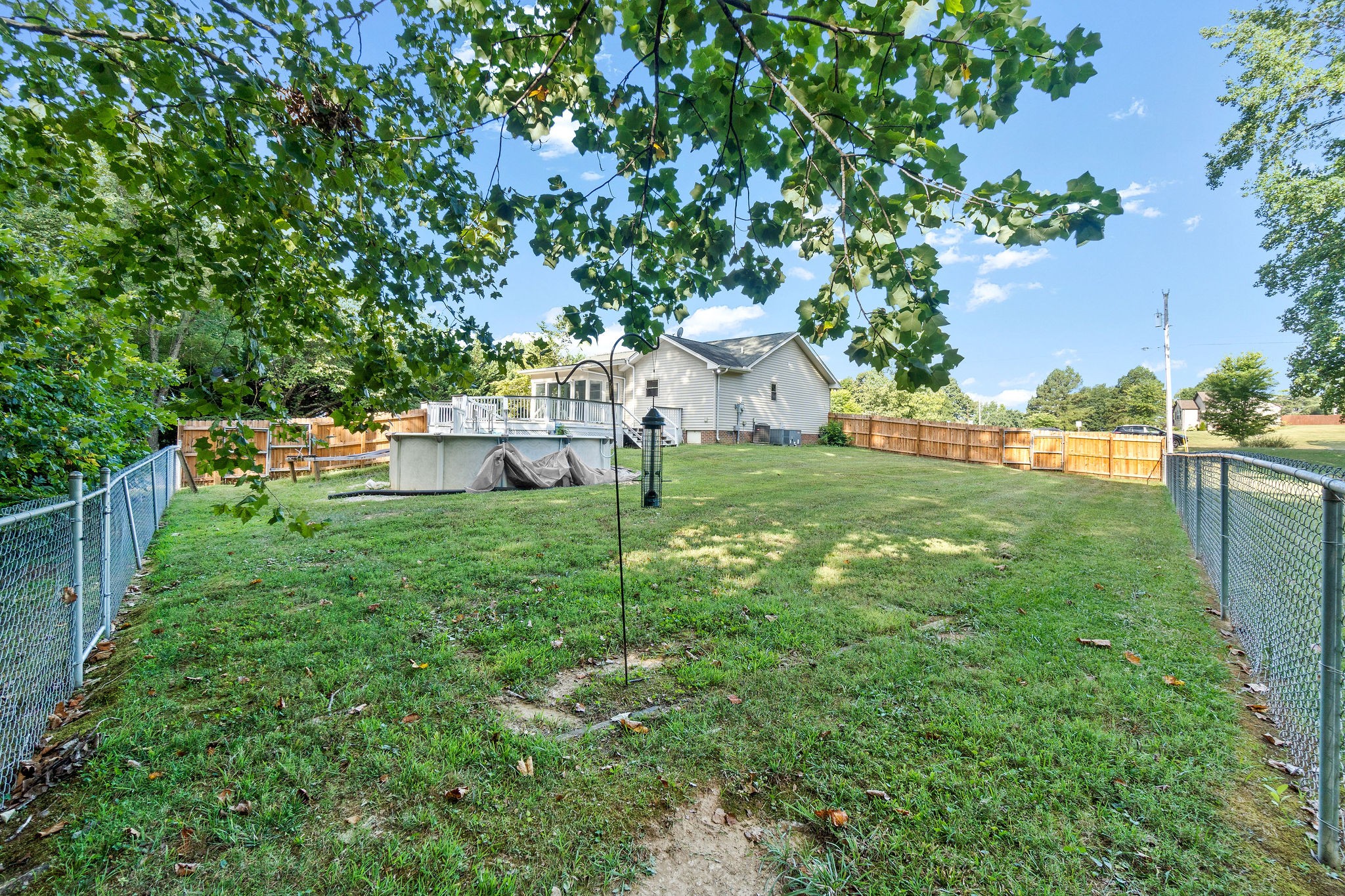 1011 Cherokee Trail Springfield, TN 37172 - Photo 39 of 40 a view of a backyard with large trees