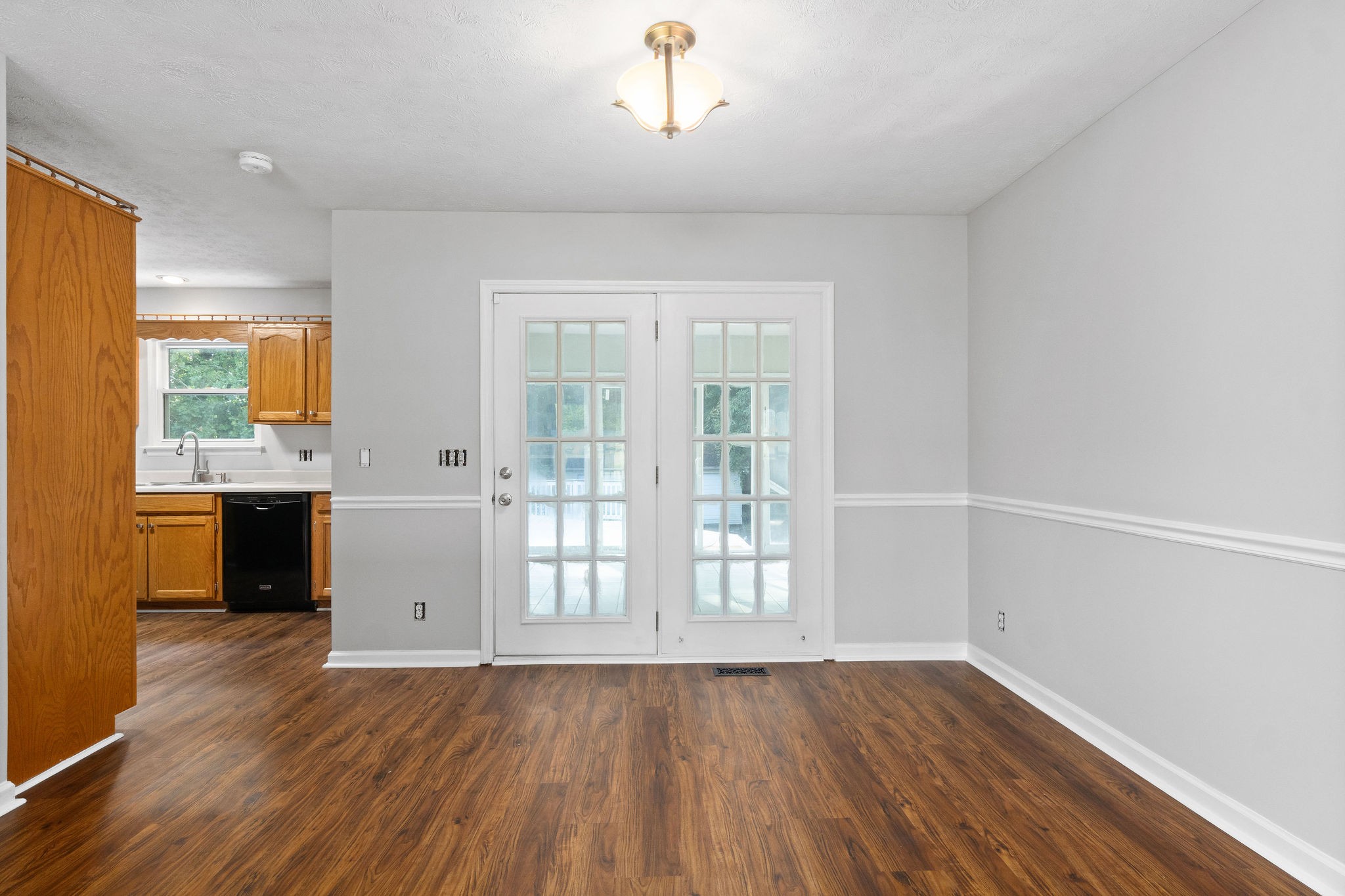 1011 Cherokee Trail Springfield, TN 37172 - Photo 8 of 40 a view of a kitchen with wooden floor and a sink