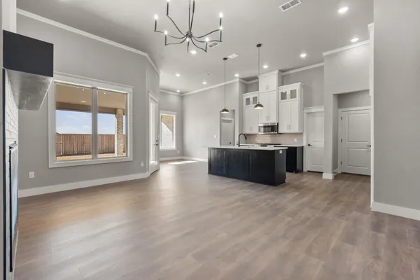 a view of kitchen and windows