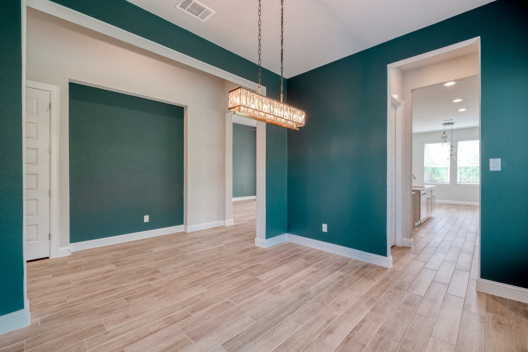 359 Raptor Beak Way Cedar Creek, TX 78612 - Photo 13 of 29 a view of a room with wooden floor
