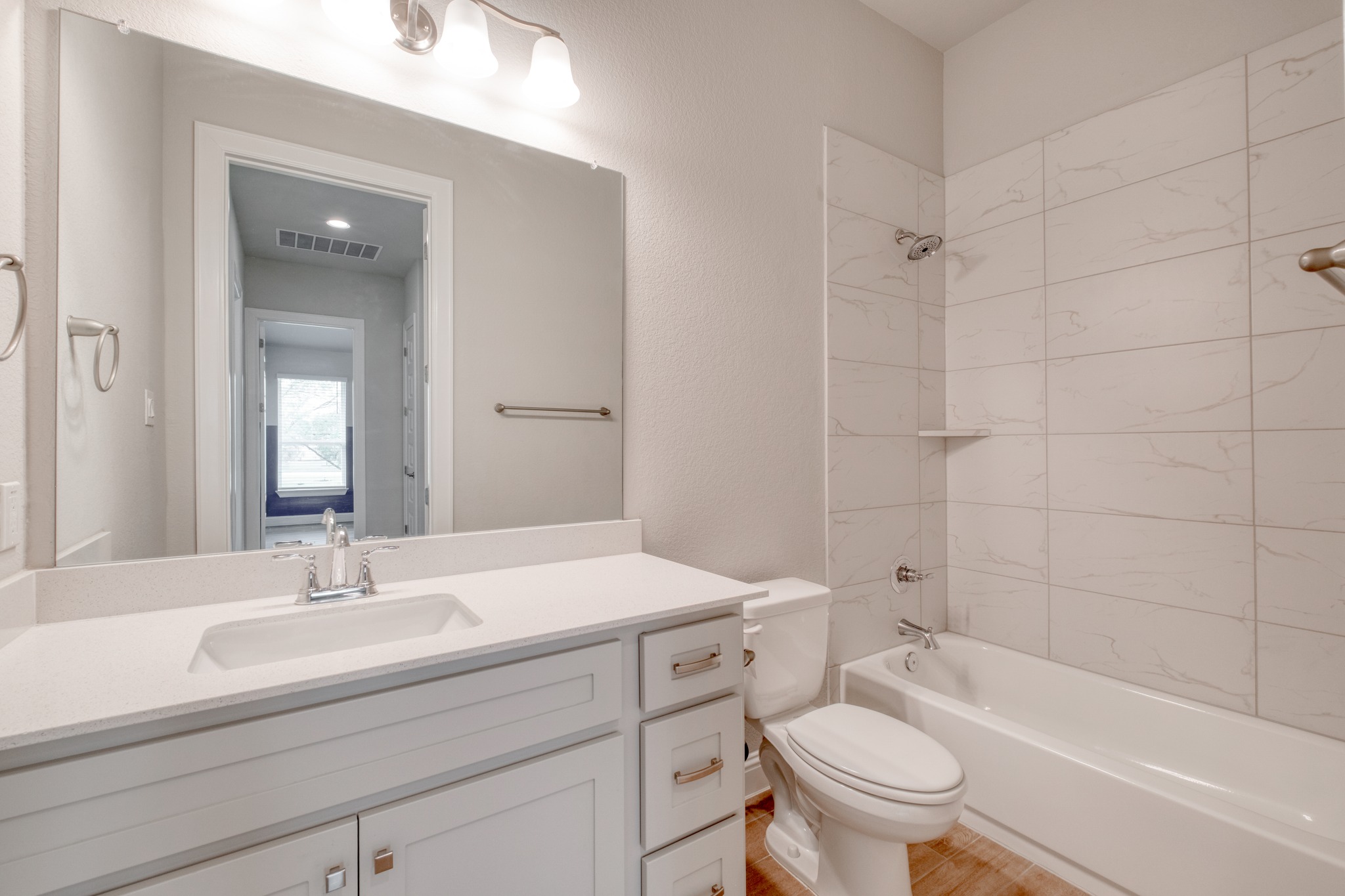 359 Raptor Beak Way Cedar Creek, TX 78612 - Photo 25 of 29 a bathroom with a sink a toilet and shower