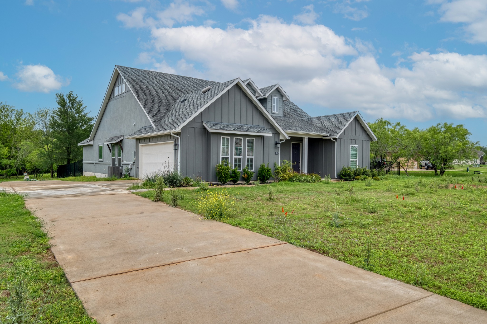 359 Raptor Beak Way Cedar Creek, TX 78612 - Photo 3 of 29 a front view of house with yard and green space