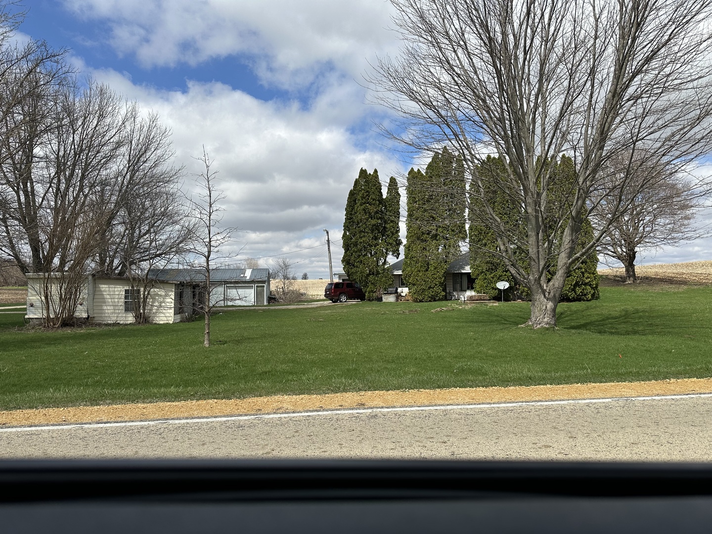 a view of a house and a yard