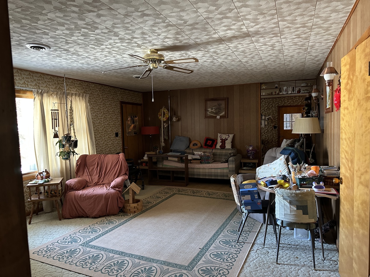 2999 Hartman Road Chadwick, IL 61014 - Photo 3 of 12 a living room with furniture and a flat screen tv