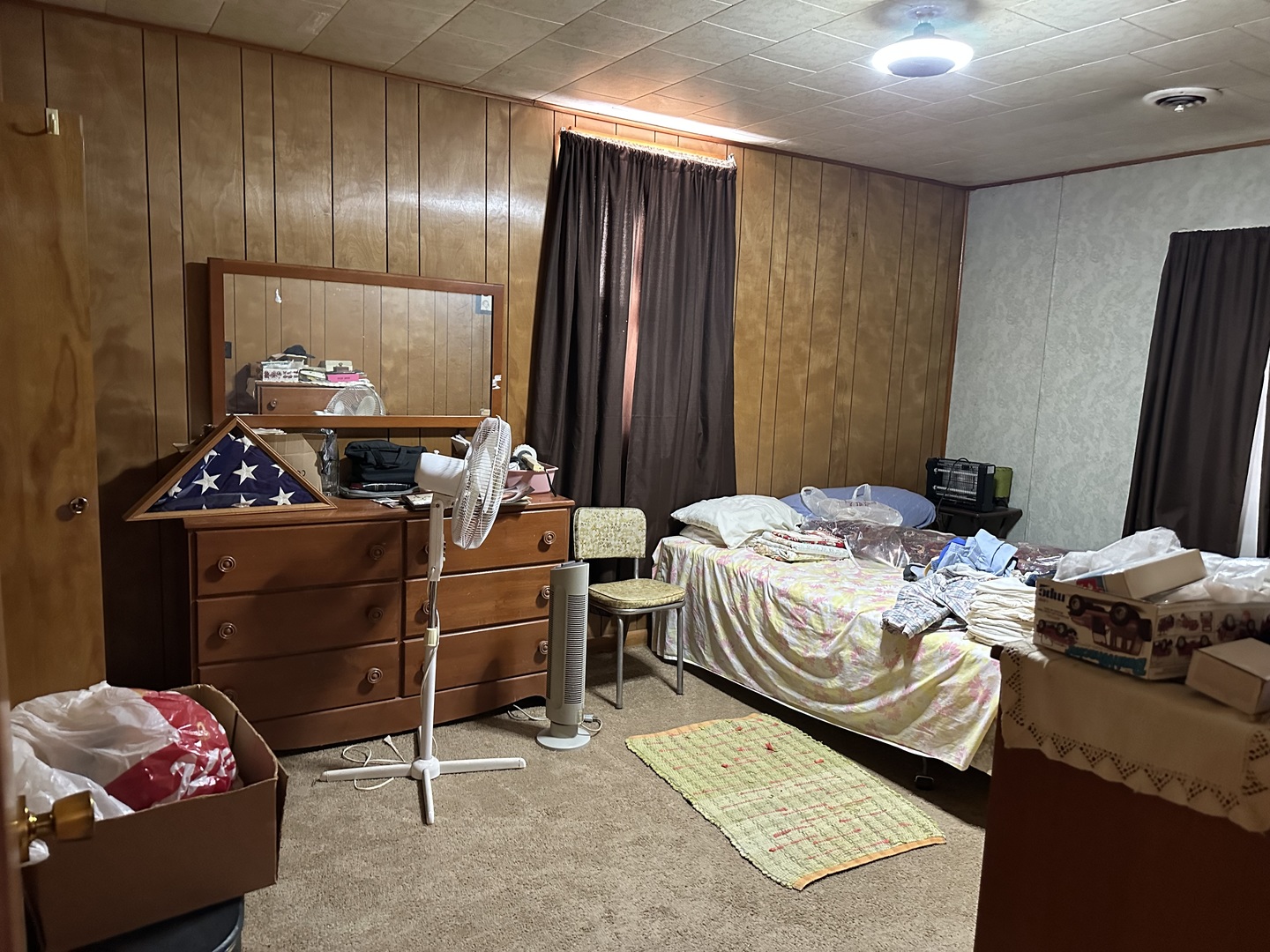 2999 Hartman Road Chadwick, IL 61014 - Photo 8 of 12 a bedroom with a bed and a mirror