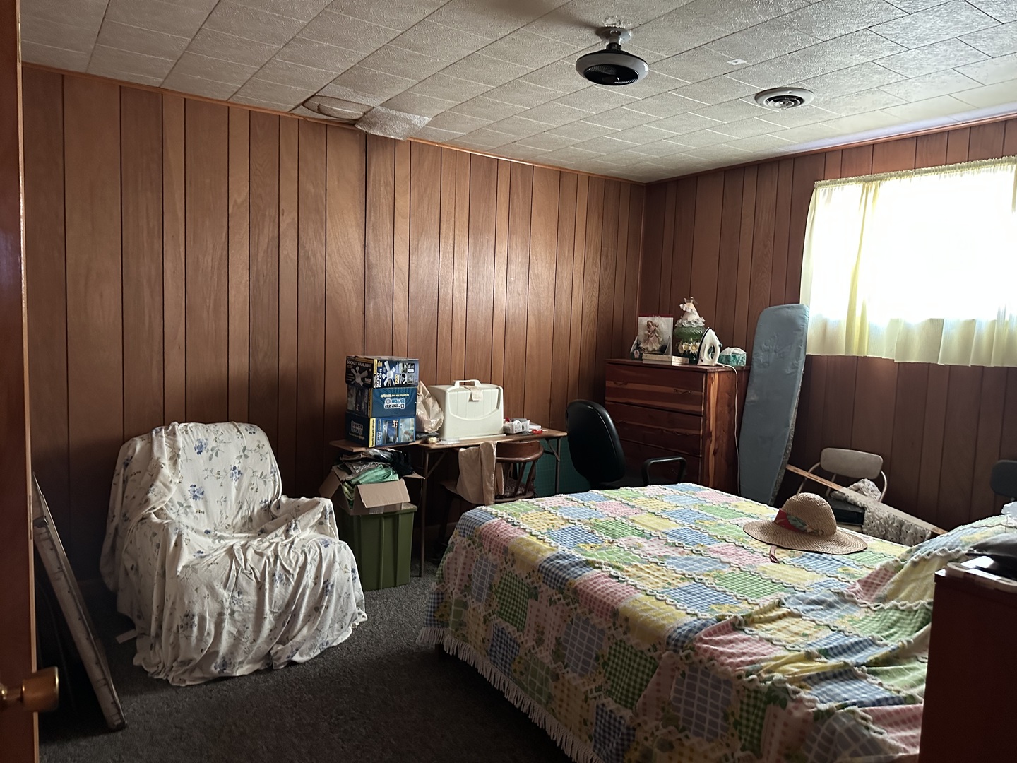 2999 Hartman Road Chadwick, IL 61014 - Photo 10 of 12 a bedroom with bed and a chair