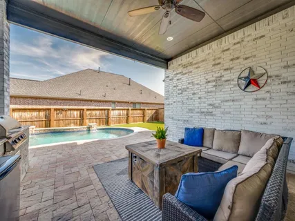 a living room with a couch and a table