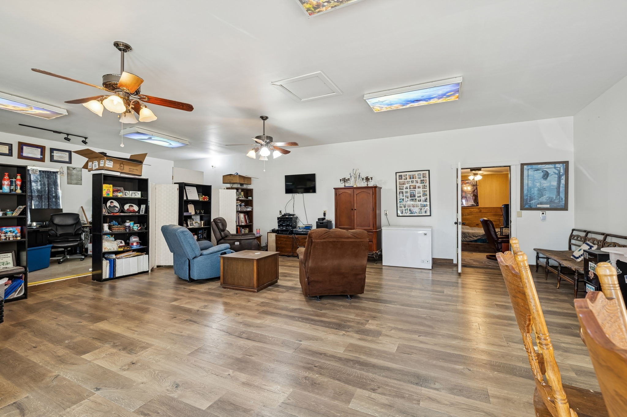 330 Deerfield Road Sparta, TN 38583 - Photo 26 of 34 a living room with furniture kitchen view and a wooden floor