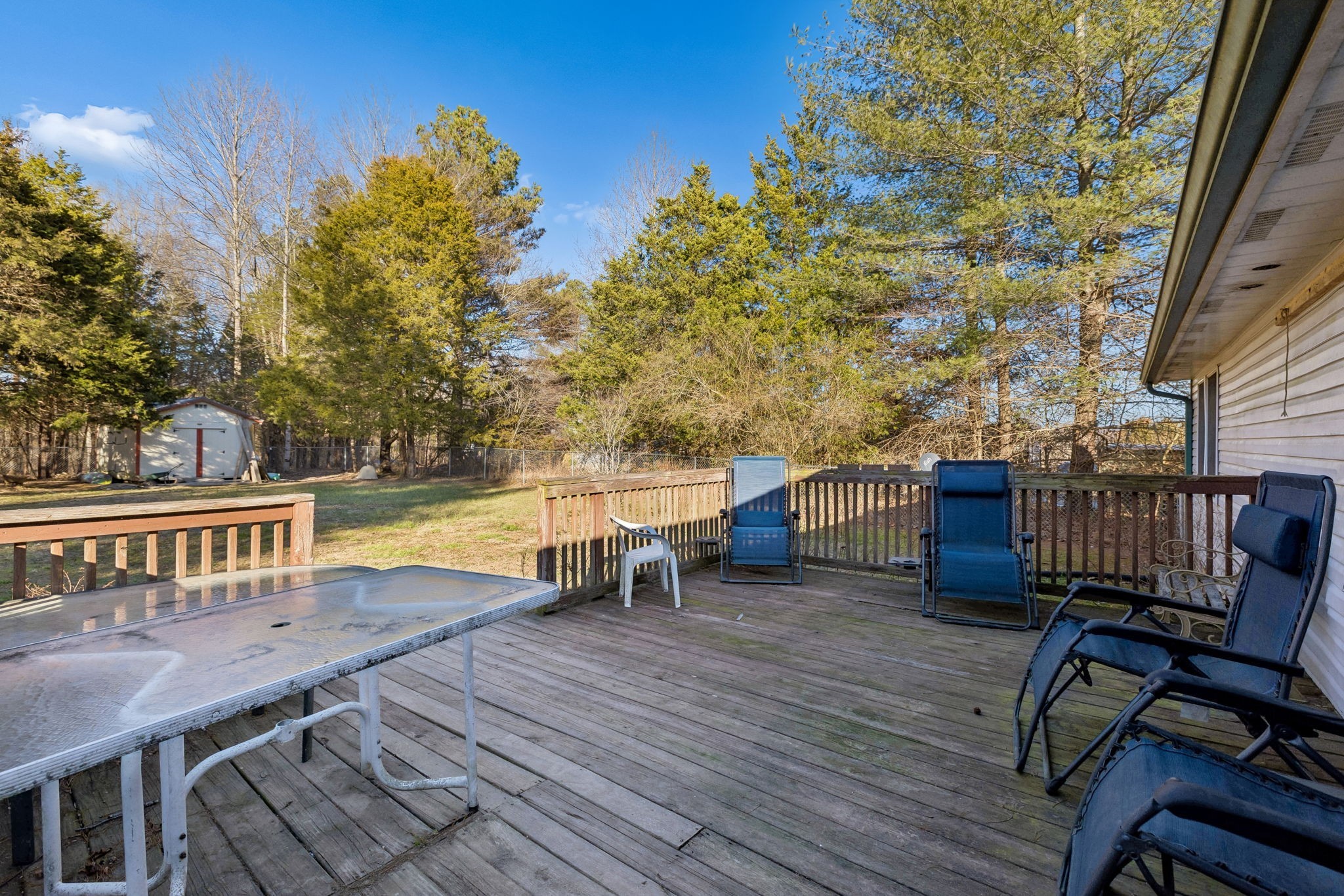 330 Deerfield Road Sparta, TN 38583 - Photo 30 of 34 a view of a chairs and table on the wooden roof deck