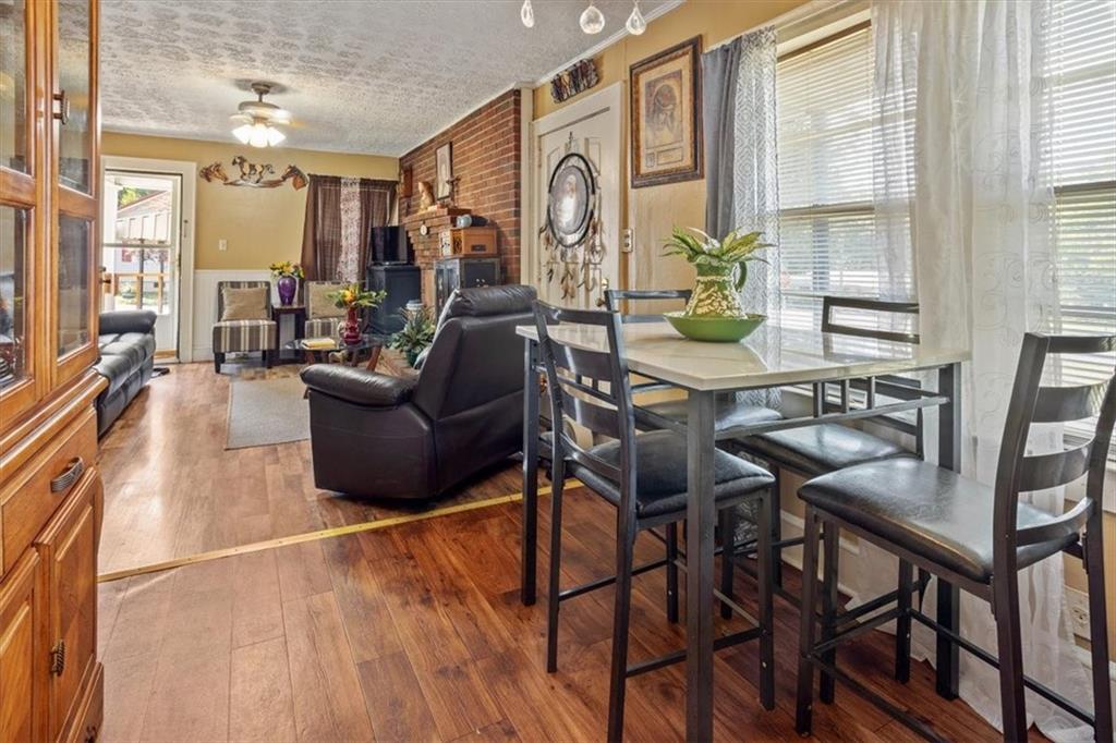 2523 Maple Road Southeast Rome, GA 30161 - Photo 12 of 30 a living room with furniture and a large window