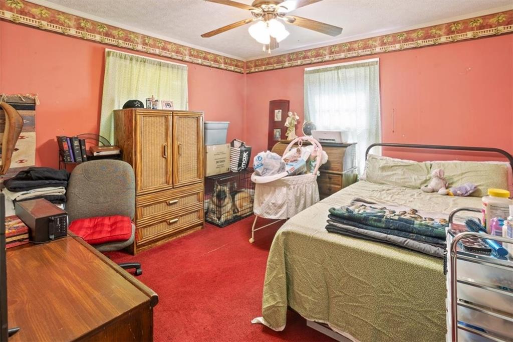 2523 Maple Road Southeast Rome, GA 30161 - Photo 16 of 30 a bedroom with bed and a window