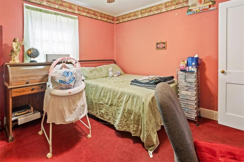 2523 Maple Road Southeast Rome, GA 30161 - Photo 17 of 30 a bedroom with a bed and a dresser