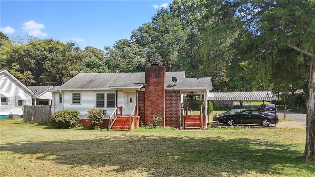 2523 Maple Road Southeast Rome, GA 30161 - Photo 3 of 30 front view of a house with a patio
